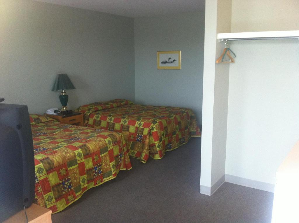 Raccoon Lodge Motel Sylvan Lake Habitación foto